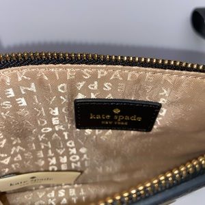 Kate spade black and gold small wristlet
